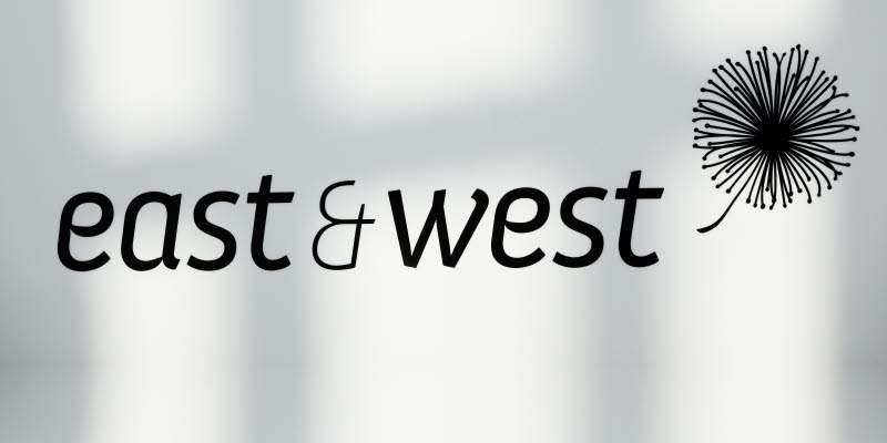 East and West logo