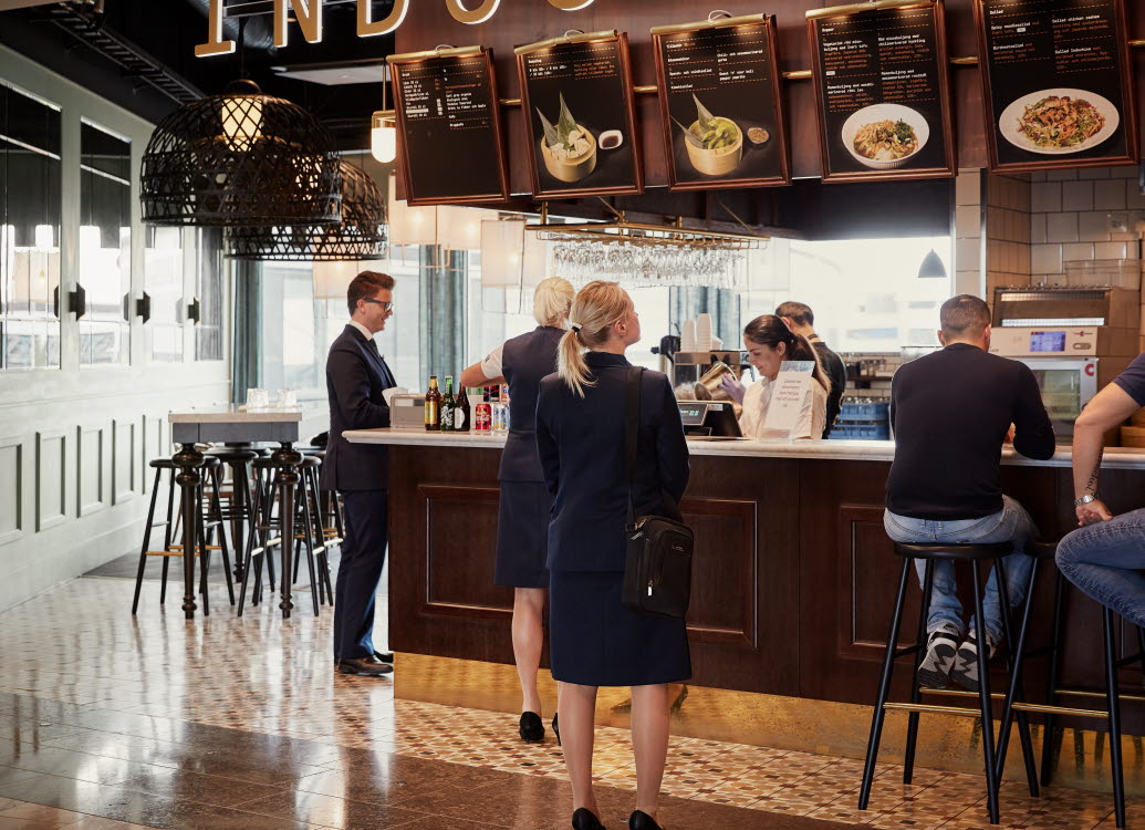 Indochine guests looking at the menu