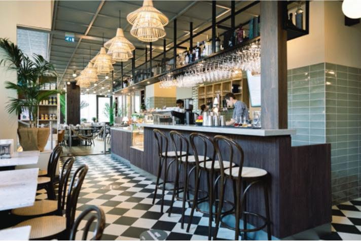 Restaurant interior with view of the bar.