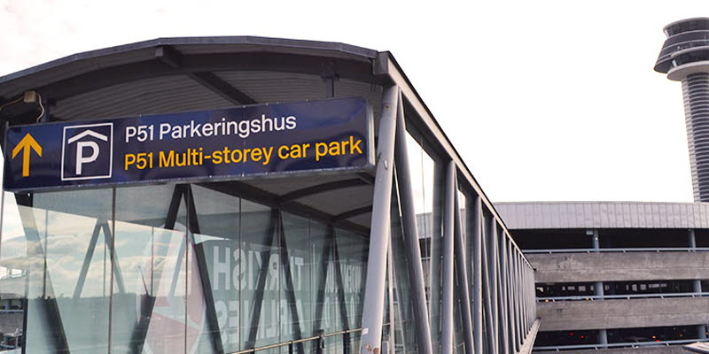 Car park with Arlandas' control tower in the background