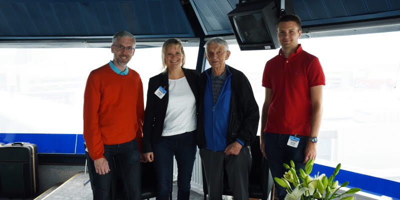 Four people standing in the ramp tower