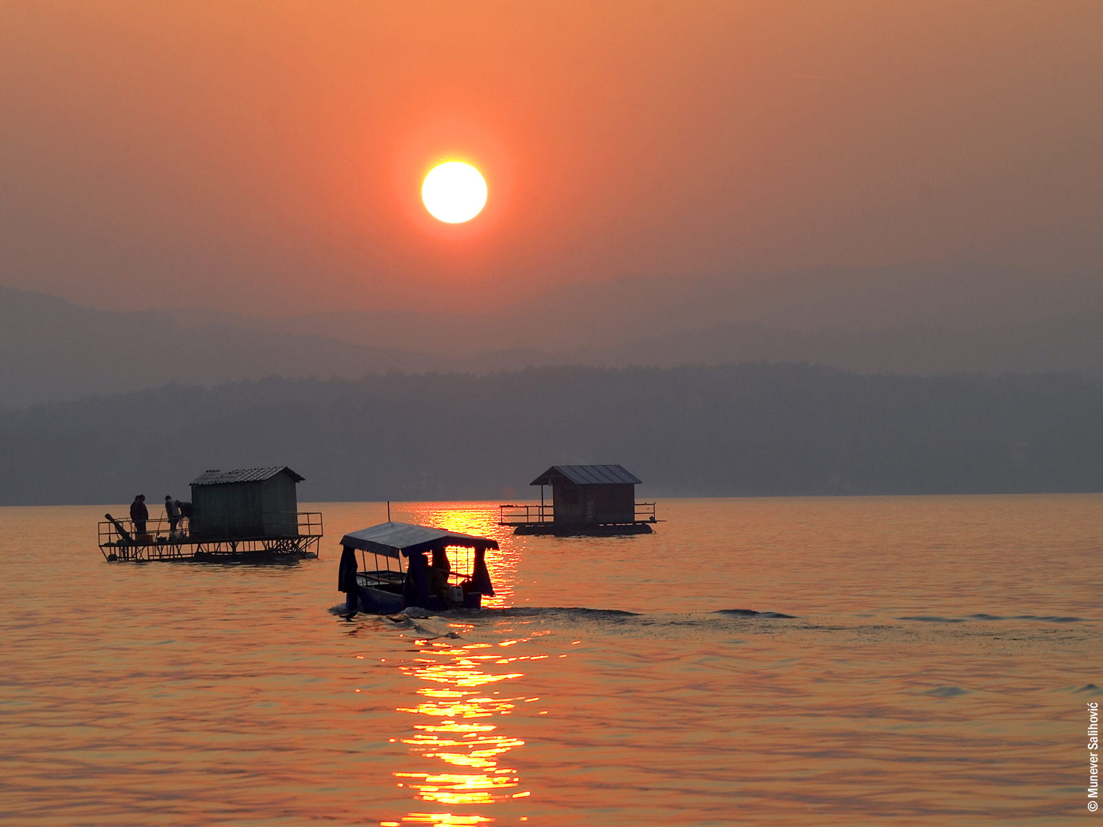 Sunset over the water in Tuzla